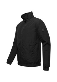 Svart zip-up jacka tillverkad av slät tyg. Har en hög krage, ribbade ärmslut och nederkant, samt två sidfickor. Minimalistisk design.