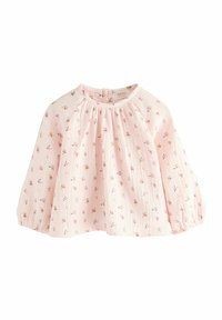 Lichtroze blouse van textuurstof, voorzien van een bloemenpatroon, ronde halslijn en puffmouwen met elastische manchetten. Achterzijde met knoopsluiting.