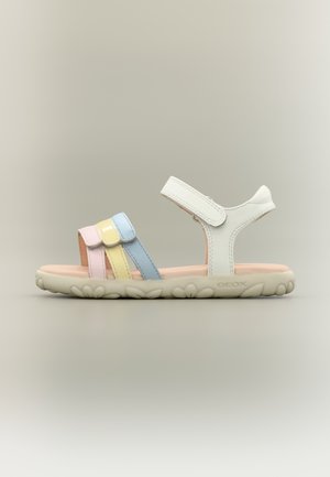 Sandale pour enfants à bout ouvert avec bride blanche à la cheville et trois lanières avant en pastel rose, jaune et bleu, semelle en caoutchouc avec motif floral.