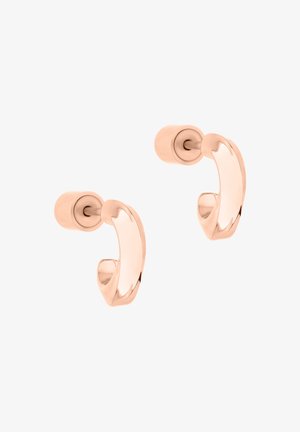 Paire de petites boucles d'oreilles à clous en or rose poli avec des bords arrondis, présentées sur un fond blanc.