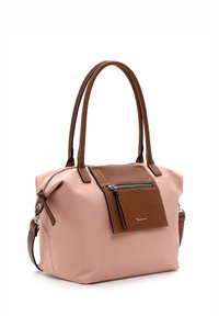Sac à main rose doux avec longues anses doubles marron, poche marron zippée à l'avant et bandoulière amovible sur fond blanc.