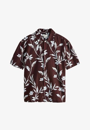 Barna rövid ujjú ing fehér virágmintával, könnyű anyagból, hegyes gallérral és gombos záródással.