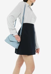 Miriade Borsa a mano - azzurro