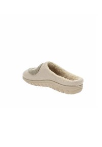 Pantofole beige con tomaia texturizzata, foderate in materiale morbido e con suola testurizzata per una buona presa, progettate per il comfort e l'uso indoor.