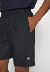 Björn Borg ACE SHORTS - Sportiniai šortai - black beauty