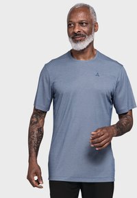 Hellblaues Sport-T-Shirt mit kurzen Ärmeln, Rundhalsausschnitt und einem markanten Logo-Detail. Verfügt über eine glatte Textur und eine lockere Passform.