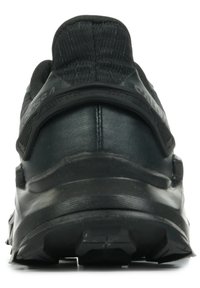 Black athletic shoe with a textured upper, padded collar, and rubber sole. Features a streamlined design and subtle branding on the heel.