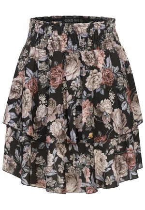 Jupe florale noire avec une taille smockée, comportant des couches superposées ornées de grandes roses roses et crémeuses ainsi que de feuilles vertes.