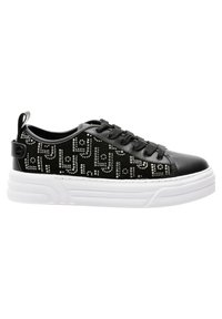Sneakers neri con tomaia in pelle liscia e tessuto testurizzato. Presentano una suola in gomma bianca e borchie decorative argentate che formano un motivo.