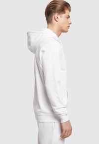 Merchcode NOW OR NEVER BASIC - Hoodie - white
