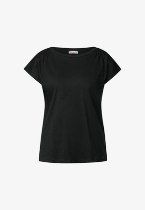 Camiseta negra de manga corta con cuello redondo, de tela suave, con sutiles pliegues en el cuerpo cerca de los hombros y un dobladillo recto. Etiqueta visible en el interior del cuello.