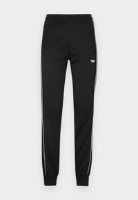 JAM PIPING - Tracksuit bottoms - black