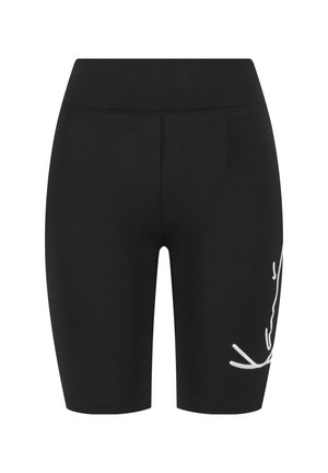 Cuissards de cyclisme noirs ajustés aux genoux avec une taille étroite et un logo blanc en écriture sur la cuisse droite.
