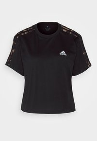 Černé zkrácené tričko vyrobené z bavlny, s krátkými rukávy, kulatým výstřihem a třemi károvanými pruhy na každém rameni. Logo Adidas v bílé barvě.