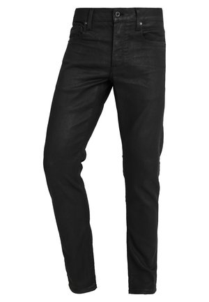 Jean noir slim avec fermeture à bouton et fermeture éclair, passants de ceinture, poches avant et arrière sur fond blanc.