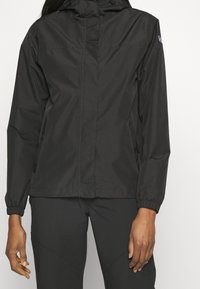 Svart lättviktsjacka med huva, elastiska ärmslut, hel dragkedja fram och sidofickor. Slät yta, hållbart material och minimalistisk design.