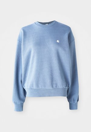 Light blue crewneck sweatshirt made of soft fabric, featuring ribbed cuffs and hem, with a small white logo on the chest.
