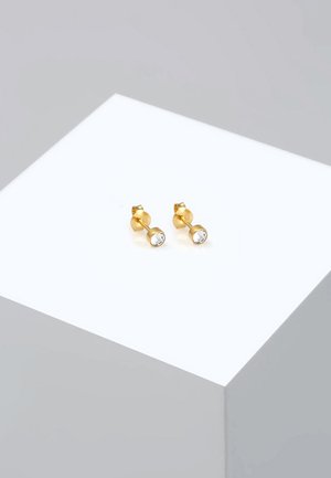 Gold metal stud earrings featuring clear round rhinestones, designed with a smooth finish and simple geometric shape.