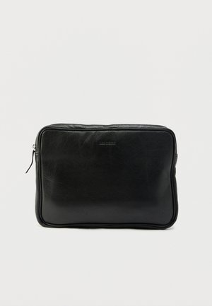 Black leather laptop case with a rectangular shape, smooth texture, and subtle stitching. Features a zip closure and embossed logo on the front.