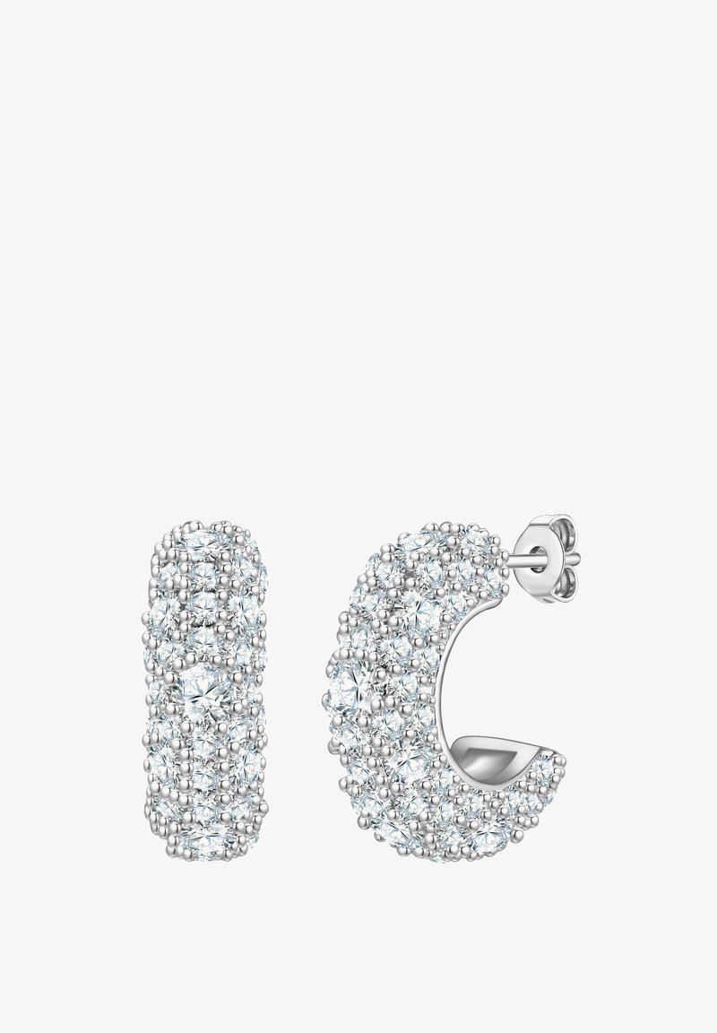 Srebrne kolczyki o fakturowanej powierzchni, ozdobione wieloma małymi przezroczystymi kamieniami. Posiadają wygięty oraz prosty kształt.