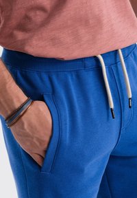 Ombre Pantaloni sportivi - blue