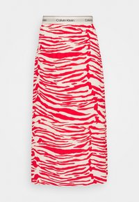 Calvin Klein maxikjol med ett röd- och krämfärgat zebramönster, i mjukt tyg och med en elastisk midja som har märkets logotyp.