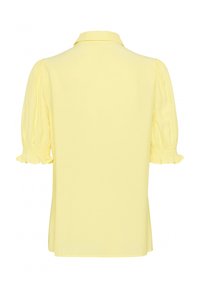 Blusa gialla con maniche corte a sbuffo, colletto e dettagli arricciati sulle maniche. Tessuto morbido con una vestibilità rilassata.