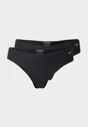 To sorte Emporio Armani underbukser stablet, hver med et lille logo på frontens venstre side.