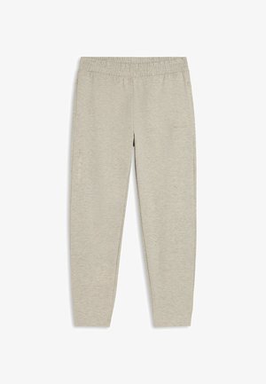 Pantalones jogger ajustados de color gris claro, hechos de una tela suave con cintura elástica. Cuenta con bolsillos laterales y un logo minimalista en la pierna izquierda.