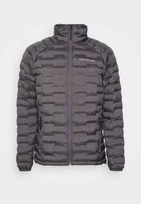 Giacca a vento nera con texture a righe orizzontali, colletto alto, zip completa e logo Peak Performance sul lato sinistro del petto. Materiale liscio.