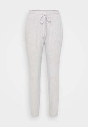 Light grey joggers with a drawstring waist, tapered legs, and soft, textured fabric. Features side pockets and ribbed cuffs.