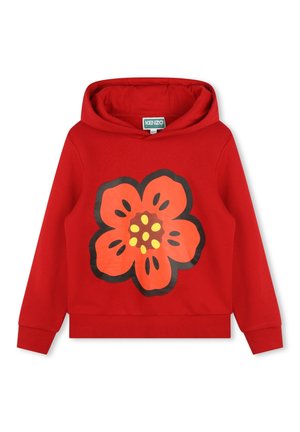 Sweat-shirt à capuche rouge présentant un grand motif de fleur orange stylisée avec des points jaunes, fabriqué à partir d'un tissu en coton doux.
