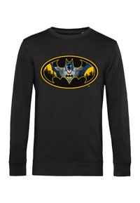 Felpa nera a maniche lunghe con logo di Batman in giallo e blu, che presenta una figura di supereroe contro uno sfondo di skyline cittadino.