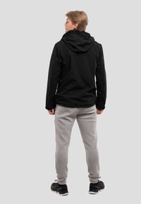 Luhta EDIS - Softshell-takki - schwarz