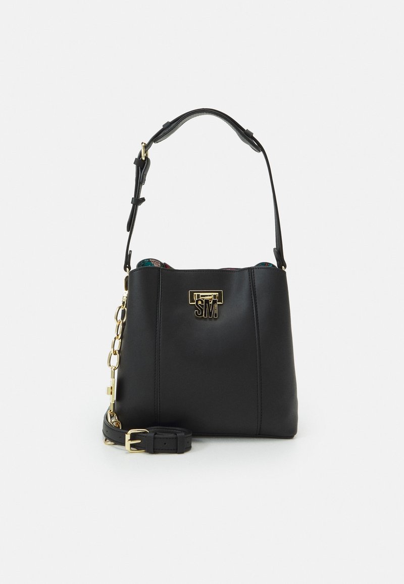 Black leather bucket bag with a gold hardware accent and chain detail, featuring a patterned interior and adjustable strap.