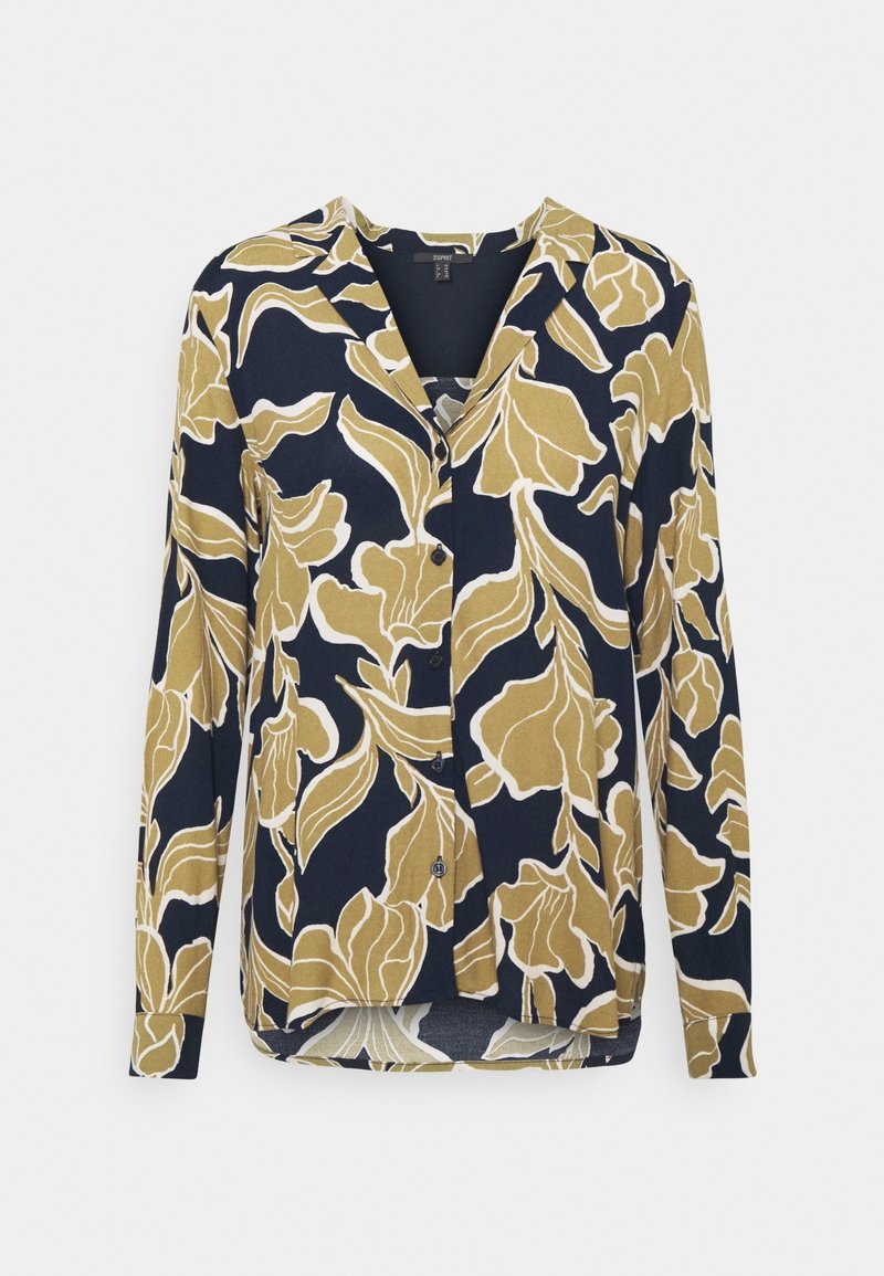 Blusa de manga larga en azul marino con un patrón floral abstracto en mostaza y blanco. Presenta un escote en V y botones en el frente. Textura de tela suave.