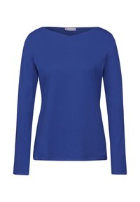 Haut à manches longues en bleu vif, présentant un décolleté en V, une coupe ajustée et un tissu en coton lisse sans motifs ni accents visibles.