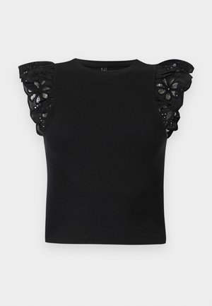 Black sleeveless top with round neckline, ribbed texture, and lace ruffle detailing with floral cutouts on the shoulders.
