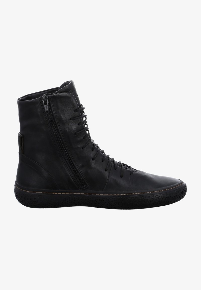 Baskets montantes en cuir noir avec fermeture éclair latérale, lacets à l'avant et semelle en caoutchouc texturée.