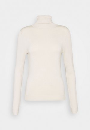 Pull à col roulé en crème, fabriqué en tissu doux, avec des manches longues, une coupe ajustée et un col côtelé, idéal pour le superposition.