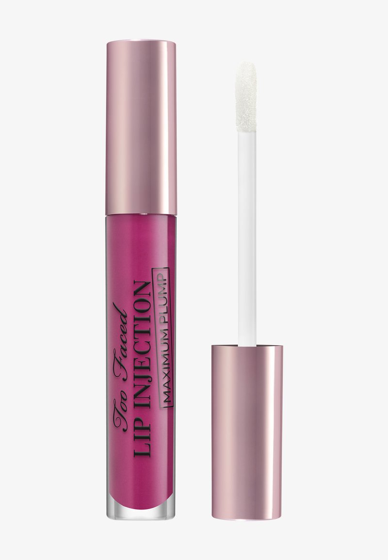 Too Faced Lip Injection in a clear tube with a pink ombre effect. Features a metallic pink cap and a white applicator wand.