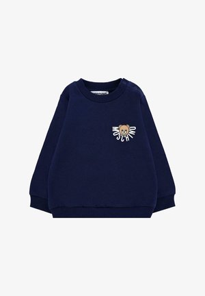 Felpa blu navy in tessuto morbido, con scollo rotondo, maniche lunghe e una grafica di un orso con la scritta "Moschino" sulla parte anteriore.