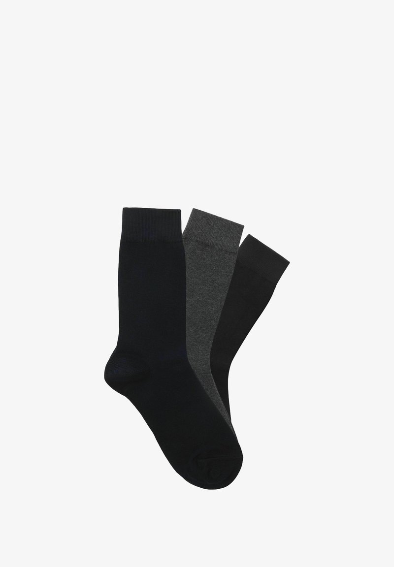 Tre par strumpor i enfärgat: en mörk marin, en kolgrå och en svart. De har en typisk längd för crew-strumpor.