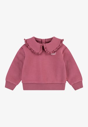Sweatshirt rose à manches longues pour tout-petit avec grand col volanté et poignets et ourlet côtelés, arborant un petit logo blanc brodé sur la poitrine.