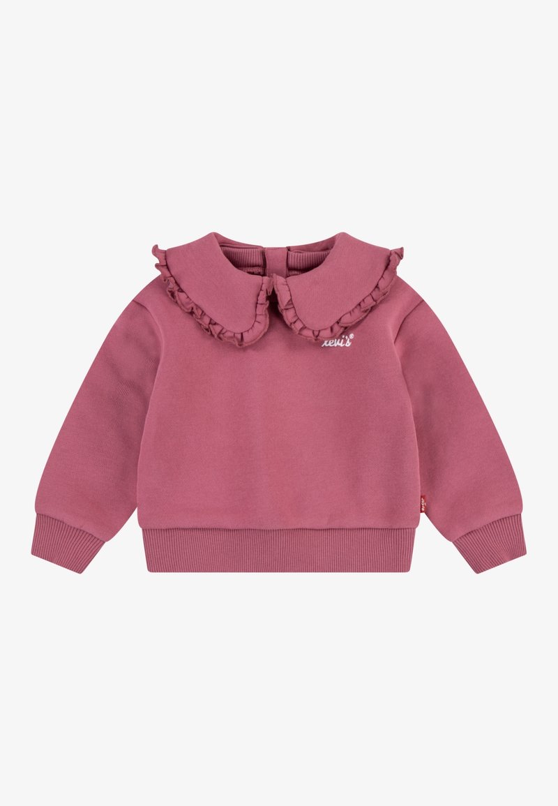 Sweatshirt rose à manches longues pour tout-petit avec grand col volanté et poignets et ourlet côtelés, arborant un petit logo blanc brodé sur la poitrine.