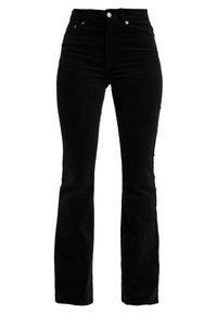 Svarta kordflorsbyxor med hög midja, med två framfickor och silverfärgade knappdetaljer för stängning. Mjukt texturerat tyg.