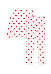 Wit katoenen loungewear set bestaande uit een sweatshirt en een broek, beide versierd met een patroon van rode harten. De manchetten en tailleband zijn geribbeld.