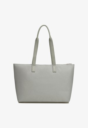 Sac cabas gris clair avec surface texturée, deux longues poignées et fermeture éclair en haut.