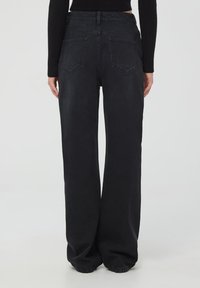 Terranova SCURI WIDE LEG - Jeans a zampa - nero denim