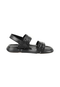 Sandale noire avec des brides en cuir texturé, sangle arrière ajustable et semelle en caoutchouc épaisse. Présente une finition lisse et un design minimaliste.